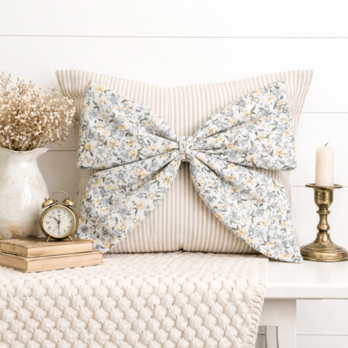 Blue & Yellow Vintage Floral Snap-It bow attached to tan and white striped Snap-It pillow