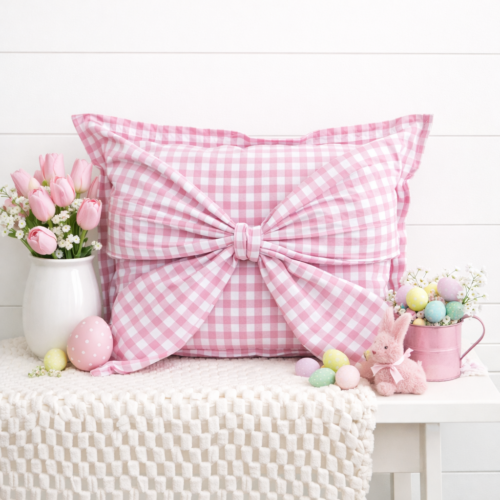 Pink gingham Snap-It bow attached to pink gingham Snap-It pillow