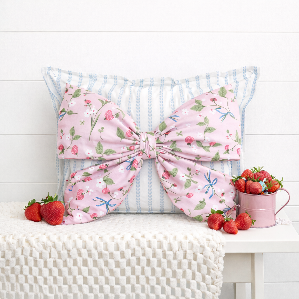 Pink Strawberries Snap-It bow attached to blue vine Snap-It pillow